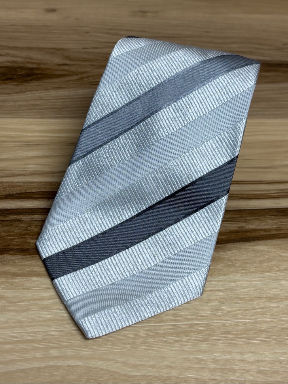 Giorgio Armani silk silver and gray striped tie size 5.9” by 3.75”.